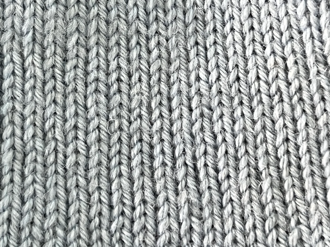 Detalle de una textura de punto gris